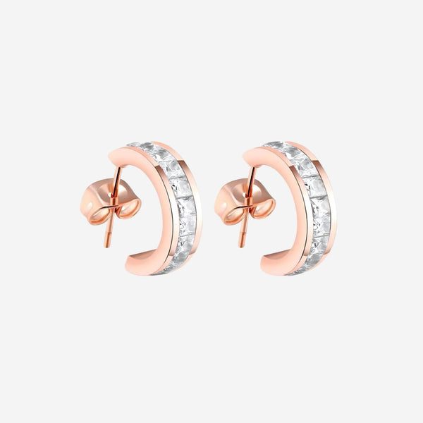 Rose gold hoop earrings with clear gemstones on a white background