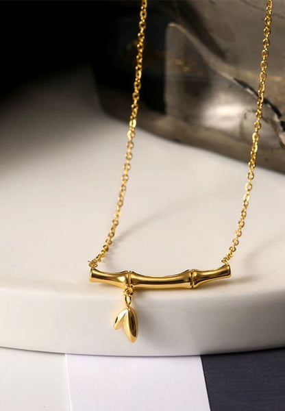Celovis Blossom Bamboo Shoot with Leaf Drop Pendant Chain Necklace in Gold